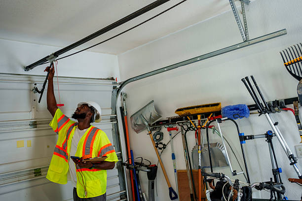 Professional Garage Door Installation technician working in Oak View, CA